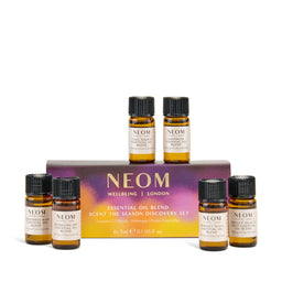 NEOM essential oil blend set with six small bottles in front of a box on a white background