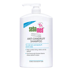 Sebamed anti-dandruff shampoo bottle on a white background