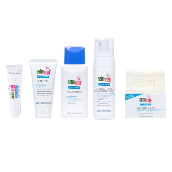 Set of Sebamed skincare products including gel, toner, foam, and bar on a white background