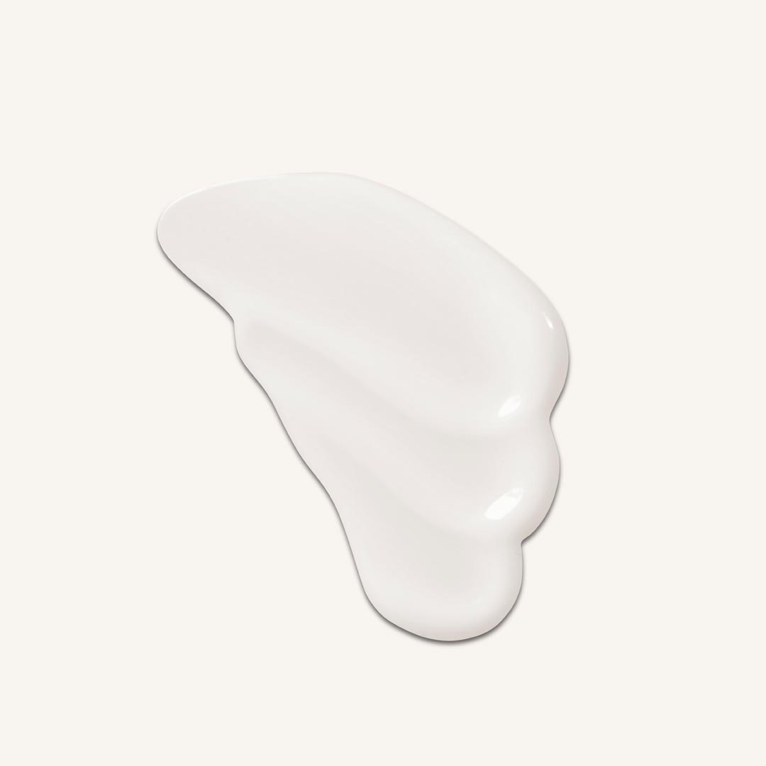 White, wavy ceramic plate on a light gray background
