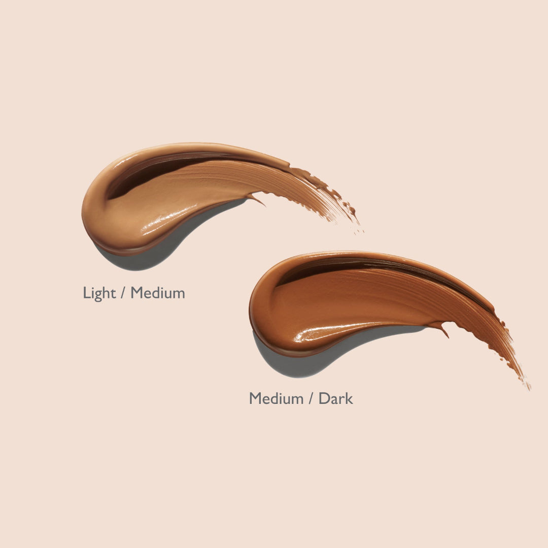 Two swatches of brown makeup cream labeled 'Light/Medium' and 'Medium/Dark' on a beige background.