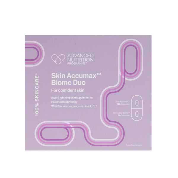 A square product box for Advanced Nutrition Programs Skin Accumax Biome Duo, featuring a lavender purple background with pink and white graphic lines and text.
