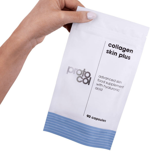 a packet of Proto-col Collagen Skin Plus held in the air