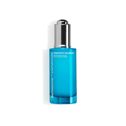 Blue skincare serum bottle with silver cap on a white background