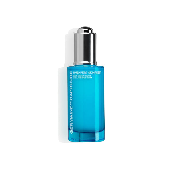 Blue skincare serum bottle with silver cap on a white background
