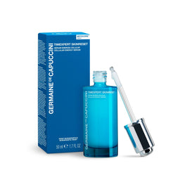 Blue skincare serum bottle with dropper and packaging on a white background