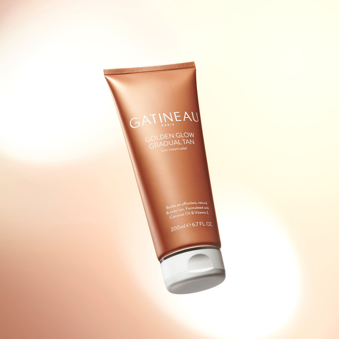Gatineau Golden Glow Gradual Tan tube on a gradient background