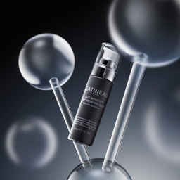 Gatineau Age Benefit Night Renewal Elixir surrounded by glass orbs