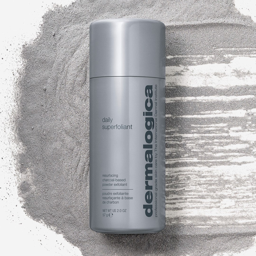 Dermalogica daily superfoliant bottle on a textured gray background