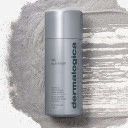 Dermalogica daily superfoliant bottle on a textured gray background