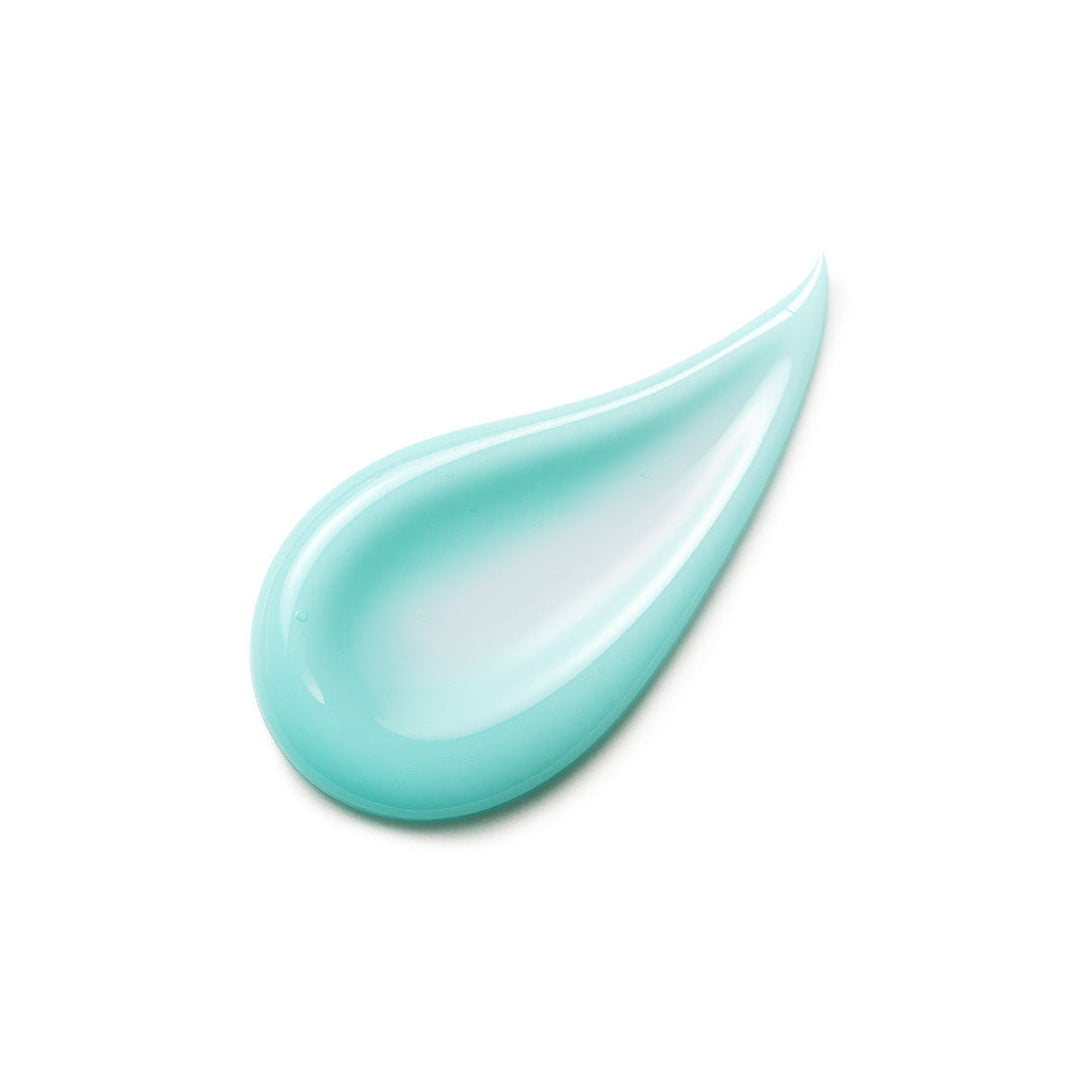 Turquoise cream droplet on a white background