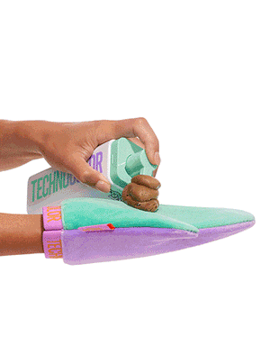 Bondi Sands Technocolour Emerald 1 Hour Express Self Tanning Foam applied to a glove