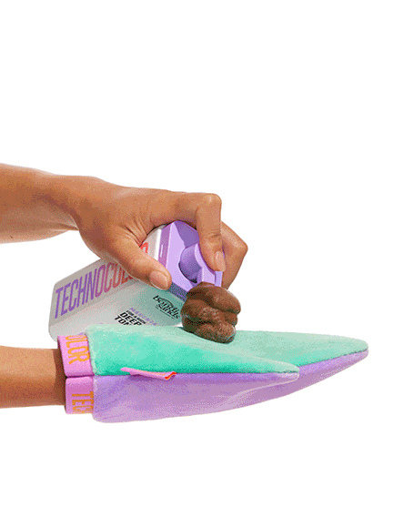 Bondi Sands Technocolour Magenta 1 Hour Express Self Tanning Foam applied to a glove