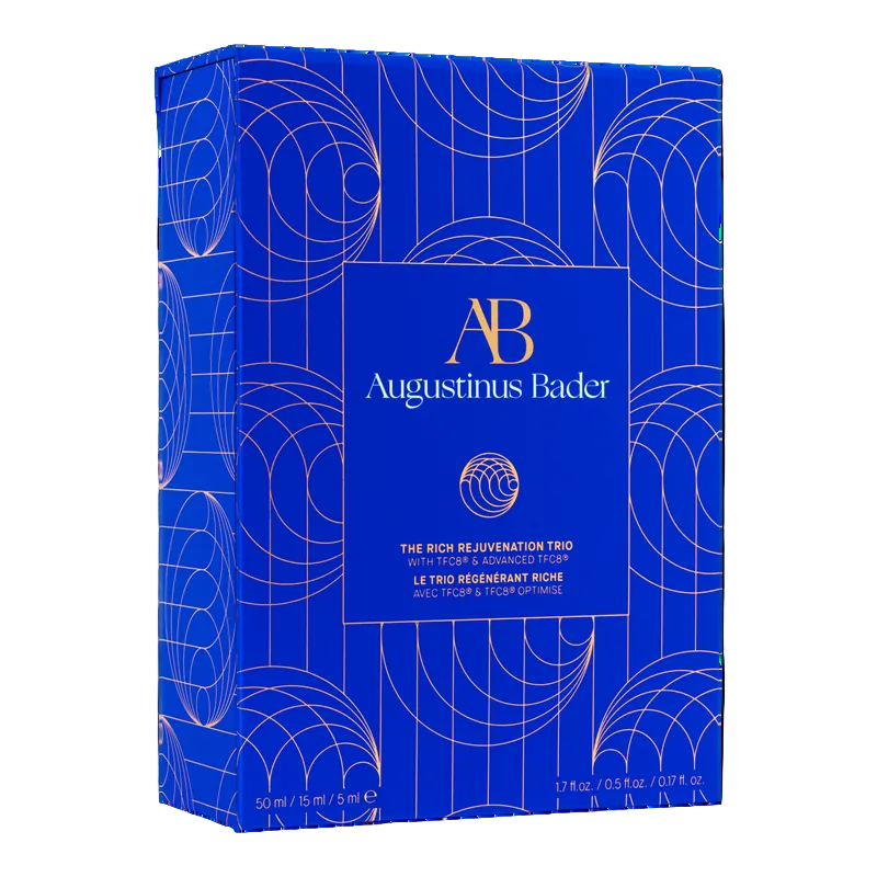 Augustinus Bader The Rich Rejuvenation Trio gift set in a blue and gold patterned box, photographed on a clean white background.