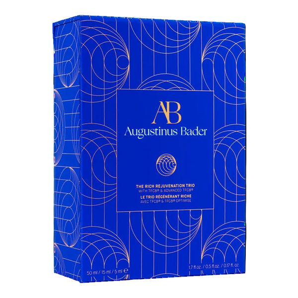Augustinus Bader The Rich Rejuvenation Trio gift set in a blue and gold patterned box, photographed on a clean white background.