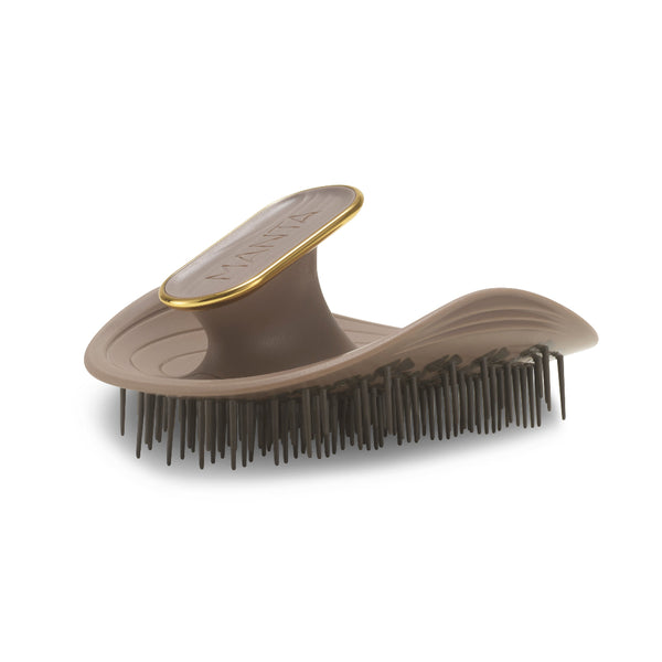 A Tangle Teezer hairbrush in taupe brown with a gold accent trim and dark brown bristles, shown on a clean white background.