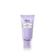 Prai Beauty Ageless Throat & Decolletage Serum in a lavender purple squeeze tube with a clear cap, shown on a white background.