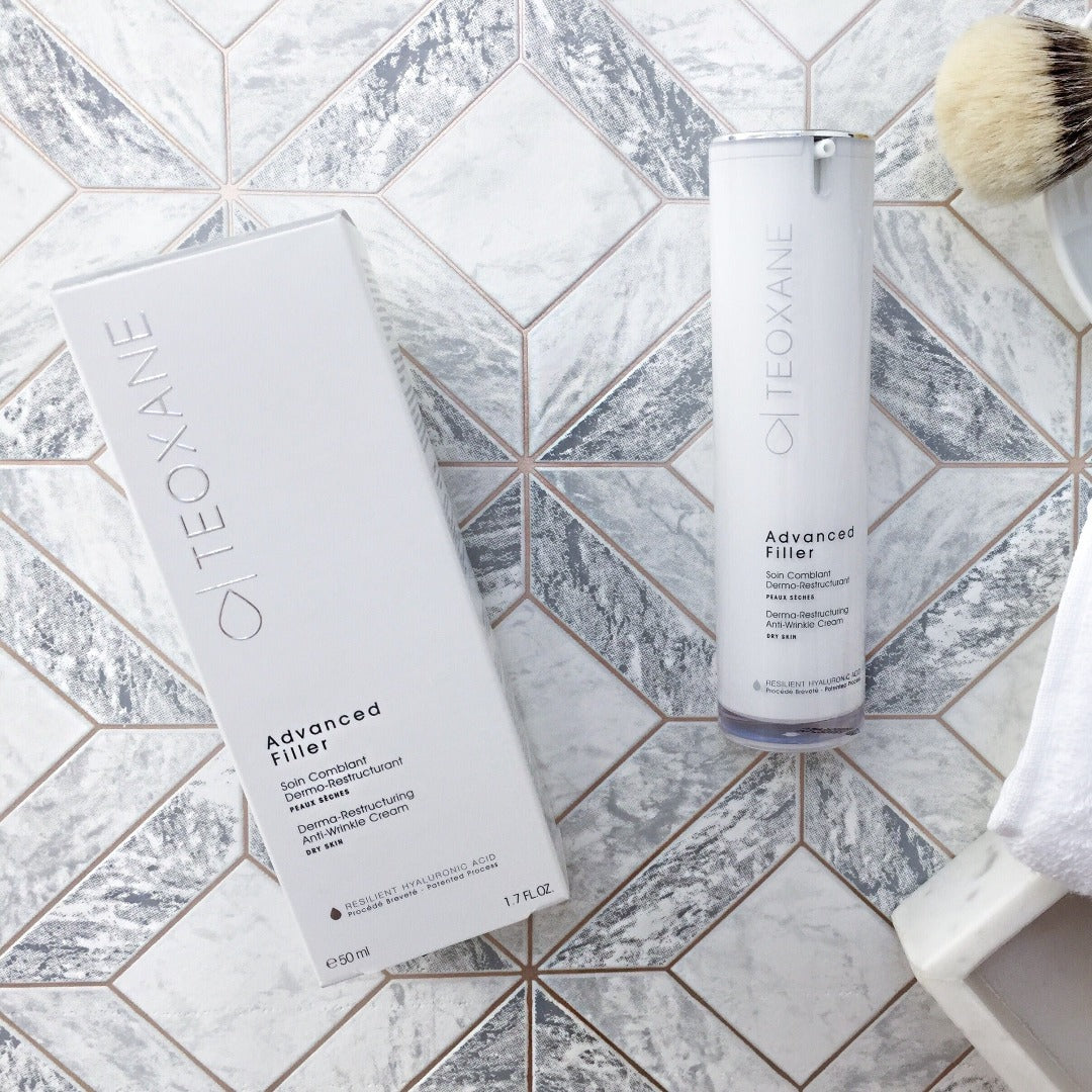 a bottle of Teoxane (Teosyal) Advanced Filler Dry Skin on a tailed floor