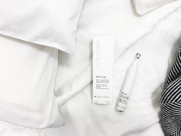 a bottle of Teoxane (Teosyal) Cosmeceuticals Advanced Filler Eyes Contour on a bed of pillows