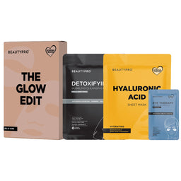 BeautyPro skincare set featuring 'The Glow Edit' box, Detoxifying Cleansing Mask pouch, Hyaluronic Acid Sheet Mask pouch, and Eye Therapy mask packet, arranged on a white background.