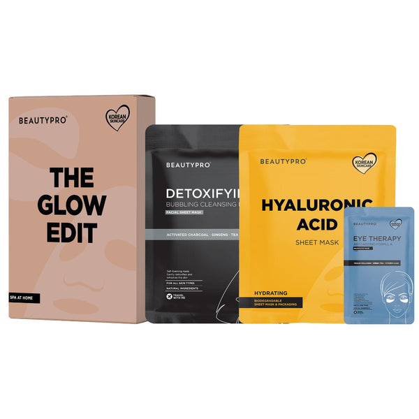 BeautyPro skincare set featuring 'The Glow Edit' box, Detoxifying Cleansing Mask pouch, Hyaluronic Acid Sheet Mask pouch, and Eye Therapy mask packet, arranged on a white background.