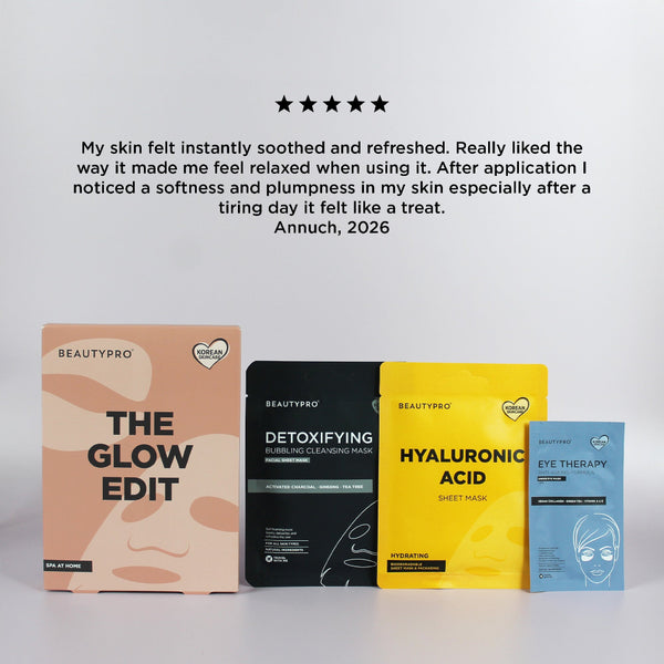 Four BEAUTYPRO sheet mask products arranged on a light gray surface against a pale gray background, with a five-star rating and a customer review text above them. The products include The Glow Edit, Detoxifying Serums, Hyaluronic Acid, and Eye Therapy sheet masks in peach, black, yellow, and blue packaging.