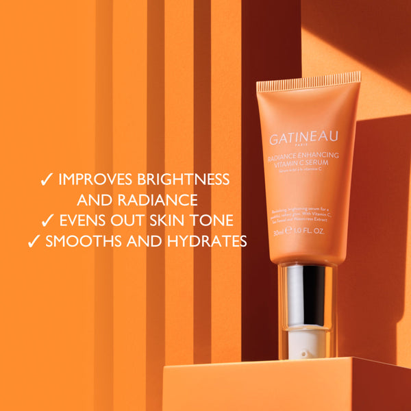 Gatineau skincare serum bottle on an orange background with product benefits listed.