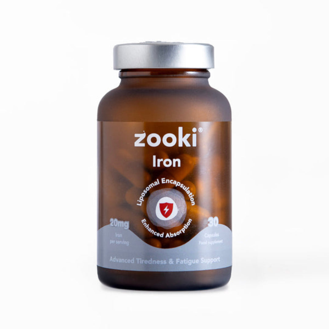 A brown amber bottle of zooki Iron dietary supplement with a silver cap, shown on a clean white background.