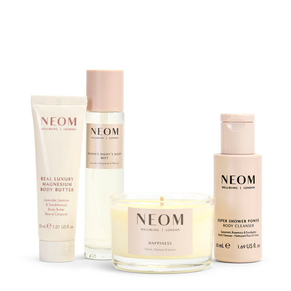 NEOM skincare and wellness products on a white background