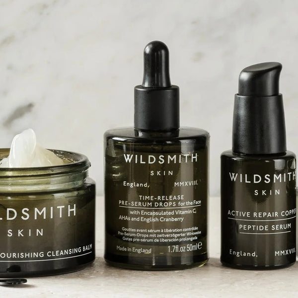 Wildsmith Skin Time-Release Pre-Serum Drops 50ml in the middle with Nourishing Cleansing balm (left) and Active Repair Copper Peptide Serum (right)