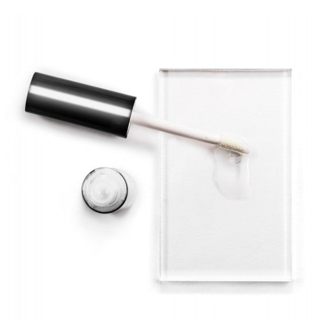 Avant Skincare Anti-Ageing Collagen Lip Line Corrector with its contents poured onto a slate