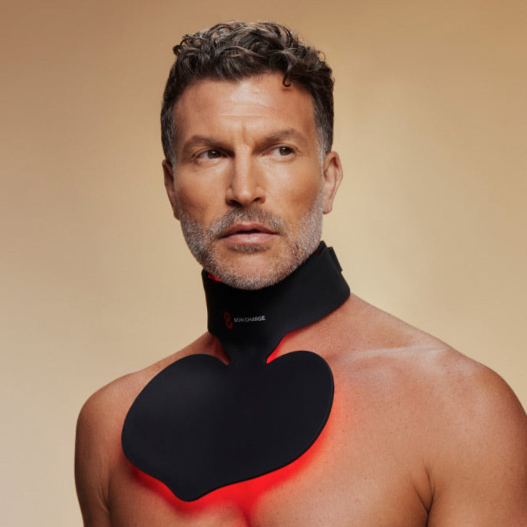 Man Wearing Red Light Neck and Chest Mask