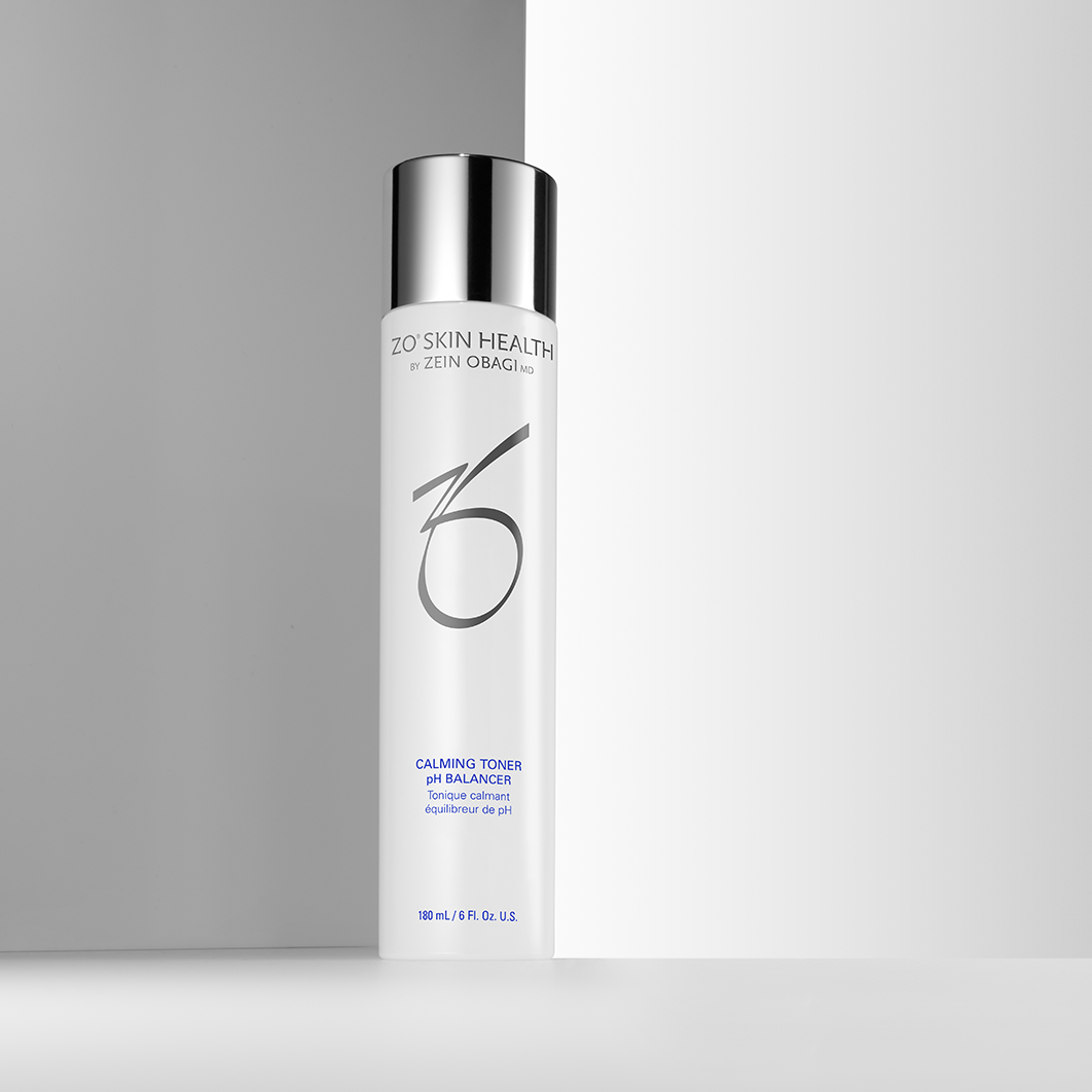 White ZO Skin Health Calming Toner pH Balancer on grey background