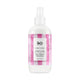R+Co Candy Stripe hair spray bottle with pink and white checkered design on a white background