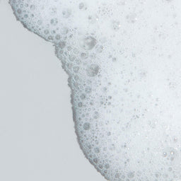 Foamy boundary on a light gray background