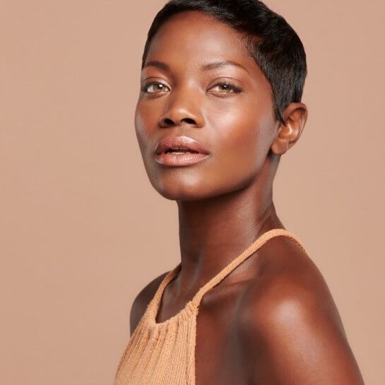 Model after using Colorescience Sunforgettable Total Protection Face Shield SPF 50 Bronze