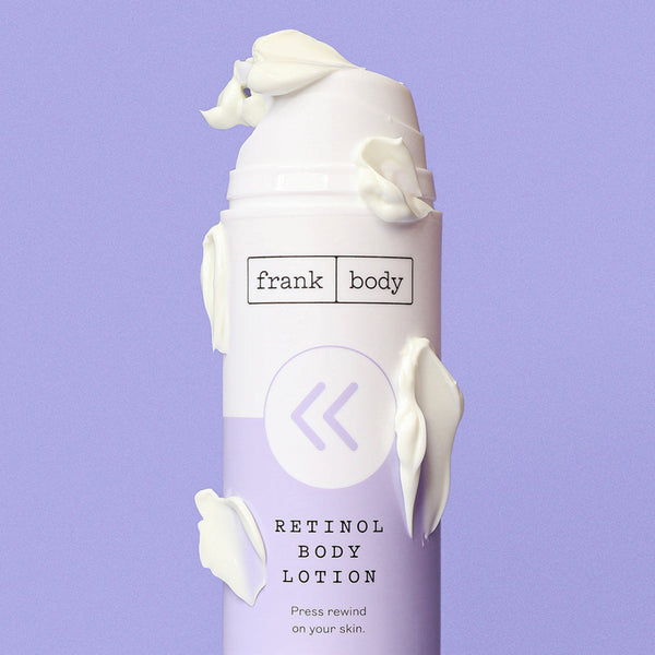 Retinol body lotion bottle with 'frank body' branding on a purple background