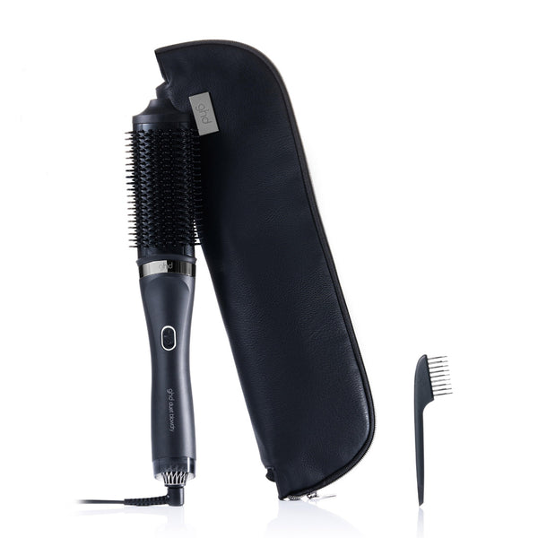 Hair styling tool with attachments on a white background