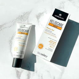 Heliocare 360 Water Gel SPF 50+ placed on a marble top
