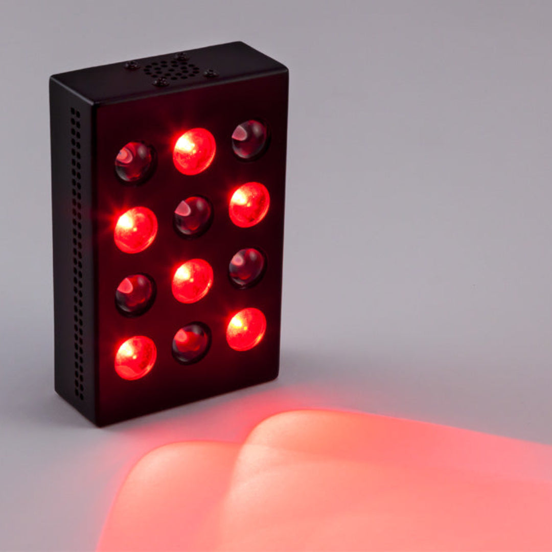 Mini Red Light Device Glow on Surface