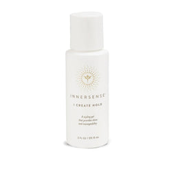 A white bottle of Innersense I Create Hold styling gel with a gold logo and text, set against a plain white background.
