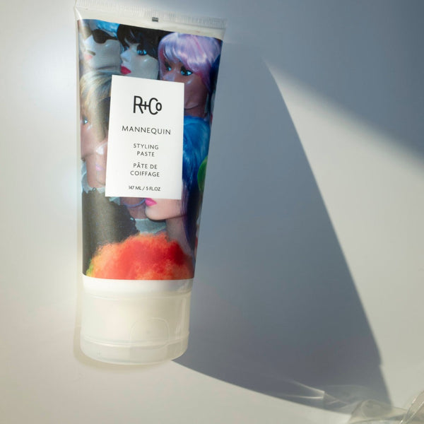 a closeup of a R+Co Mannequin Styling Paste tube