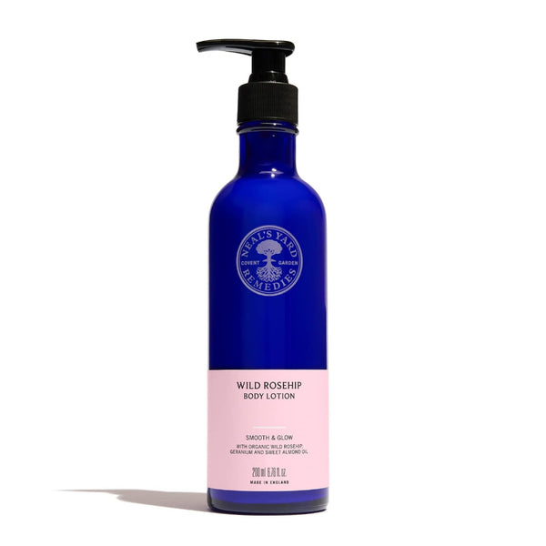 Blue bottle of Wild Rosehip Body Lotion with a pump on a white background