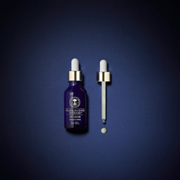 Neal's Yard Remedies Frankincense Intense Lift Serum with pipette next to the bottle