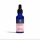 Blue bottle of Wild Rosehip Glow Facial Oil with a dropper on a white background