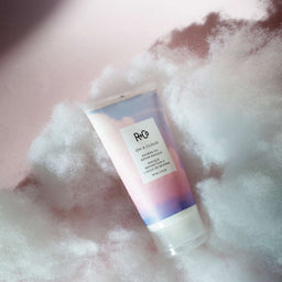 R+Co On A Cloud Repair Oil Masque tube floating on a cloud