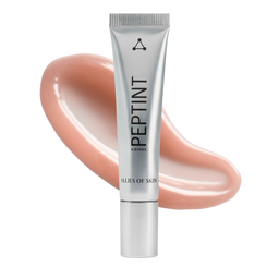 A silver squeeze tube of PEPTINT by Clés de Skin, set against a glossy peach-colored cosmetic swatch on a solid white background.