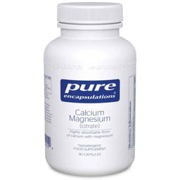 A white plastic bottle of Pure Encapsulations Calcium Magnesium supplement with a blue and white label, set against a plain white background.