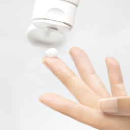 mesoestetic Hydracream Fusion poured onto a users hand