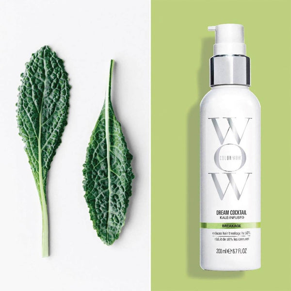 Color Wow Dream Cocktail - Kale Infused bottle next to kale leaves 
